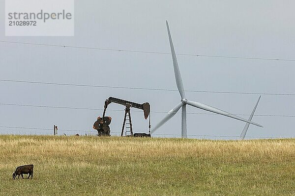 Osage Nation  Oklahoma  An oil well and wind turbines on the Osage Indian Reservation. The Osage Nation was the site of a string of murders in the early 1920s in which non-Osage sought to gain the wealth that the oil boom had brought to the Osage. Killers of the Flower Moon  by David Grann  more recently publicized these murders