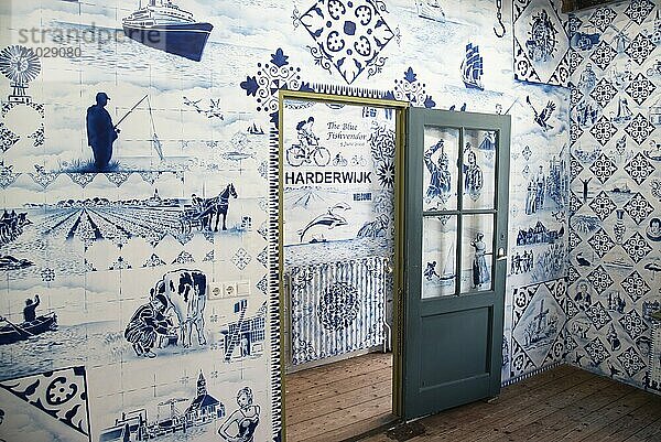 Enkhuizen  Netherlands  June 2022.An interior made of Delft blue wallpaper in the open air museum in Enkhuizen. Selective focus