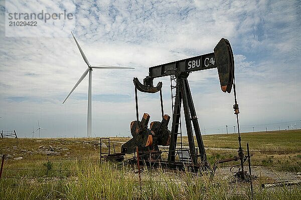 Osage Nation  Oklahoma  An oil well and wind turbines on the Osage Indian Reservation. The Osage Nation was the site of a string of murders in the early 1920s in which non-Osage sought to gain the wealth that the oil boom had brought to the Osage. Killers of the Flower Moon  by David Grann  more recently publicized these murders