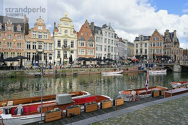 Tourist boats moored along the Graslei  Ghent  Flanders  Belgium  Europe