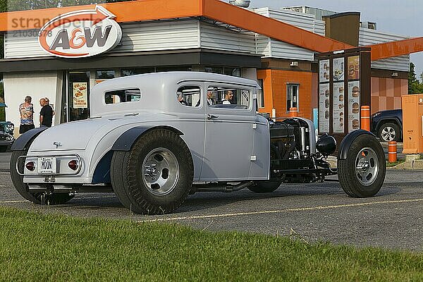 Automobile  car show  custom made vintage car with open engine display  Province of Quebec  Canada  North America