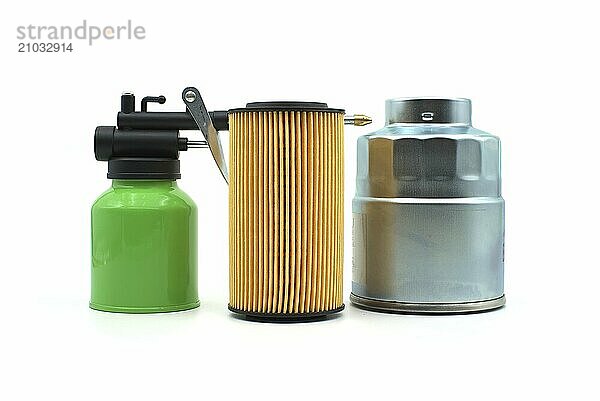 High pressure hand oiler pump machine and vehicle engine oil filters isolated on a white background. Car servicing  automotive industry and filter replacing maintenance