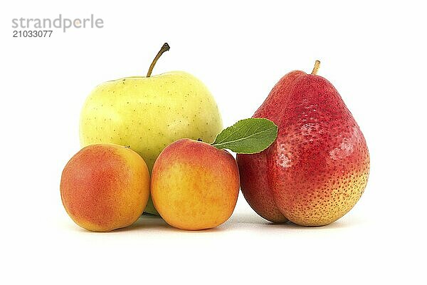 Ripe green apple  apricots and pear isolated on a white background