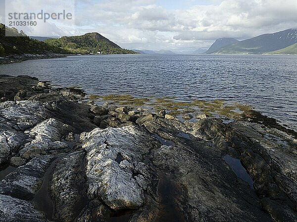 View from the coast of the Vartdalsfjord towards the Sulafjord in Norway