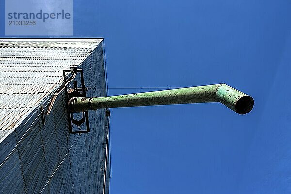 Looking up at a pipe from an old grainery in eastern Washington