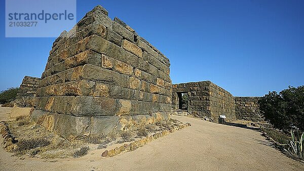 View of ancient stone walls under a clear blue sky  surrounded by barren vegetation  Palaiokastro  Ancient Fortress  3rd and 4th century BC  above Mandraki  Nisyros  Dodecanese  Greek Islands  Greece  Europe