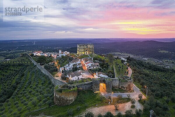 Evoramonte drone aerial view of village and castle at sunset in Alentejo  Portugal  Europe