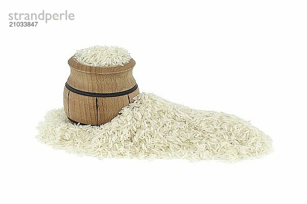 Dry long-grain rice in small wooden barrel isolated on white background