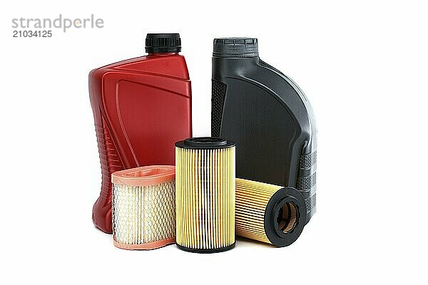 Motor oil filters elements oil and containers isolated on a white background. Car servicing  automotive industry and filter replacing maintenance