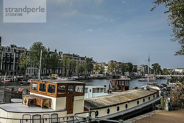 Amsterdam  the Netherlands. September 2021. The river Amstel in Amsterdam  with its drawbridges and houseboats.