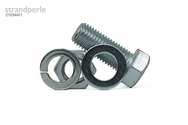 Male screw and hexagon nut  flat nut washer and spring washer coated with a protective layer of zinc isolated on white background