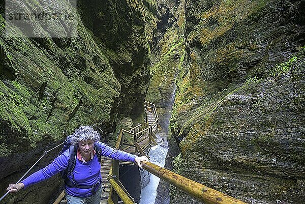 Woman on the climbing facility in the Raggaschlucht  Flattach  Carinthia  Austria  Europe