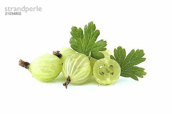 Heap of green ripe gooseberry with leaf isolated over white background