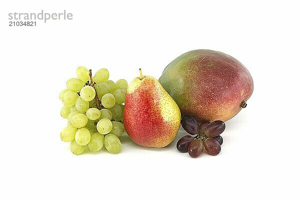 Fresh multicolored ripe pears and mango fruits  red and green grapes isolated on white background. Multivitamin and juicy rich fruits