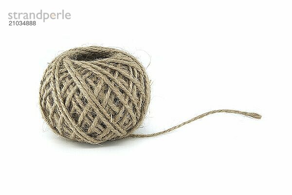 Spool of jute twine made from natural jute materials isolated on white background