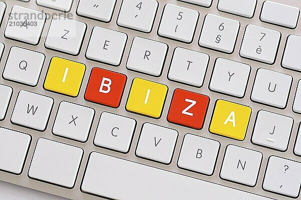 Ibiza in yellow and red on white keyboard