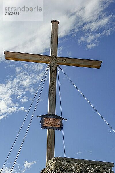 Wooden summit cross on a clear day on a mountain  oberstaufen  allgäu  bavaria  germany