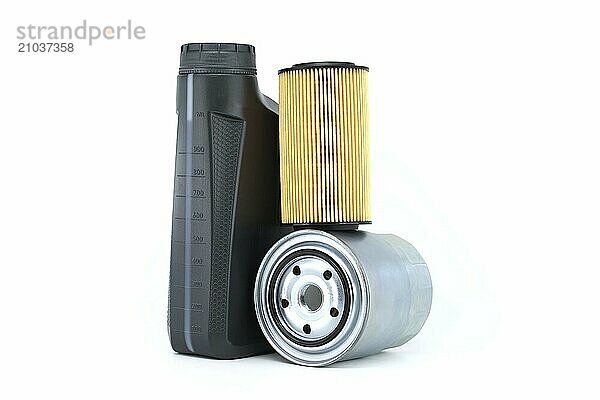 Motor oil container and filters isolated on a white background. Car servicing  automotive industry and filter replacing maintenance