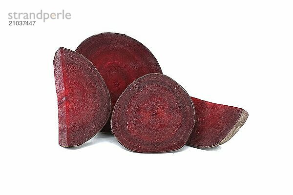 Slices of fresh beetroot isolated on white background