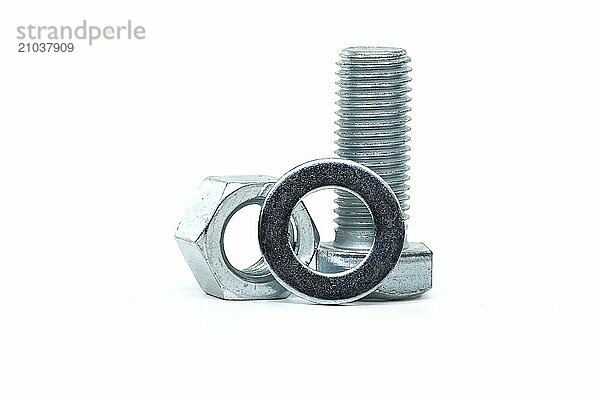 Full thread hexagon bolt and internal screw  flat nut washer and spring washer coated with a protective layer of zinc isolated on white background