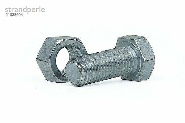 Full thread hexagon bolt and internal screw coated with a protective layer of zinc isolated on white background