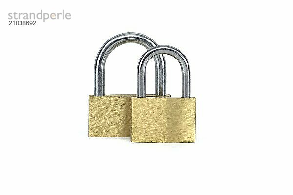 Two shiny gold padlocks that has a silver inner part isolated on white background