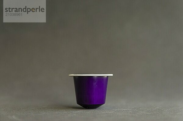 Beautiful colored coffee capsule on black background