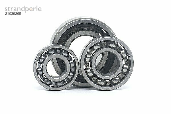 Ball bearings without seal and deep groove ball bearing with steel seal isolated on white background