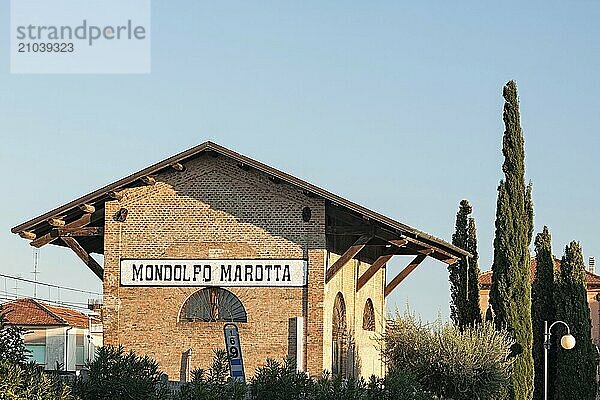 Ancient building of the train station in Marotta  Italy  Europe