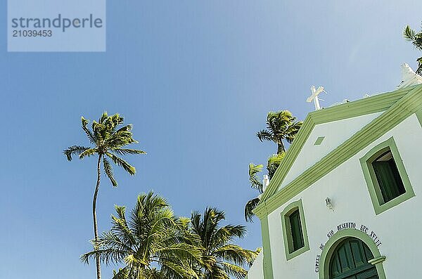 Beautiful view of (Capela de São Benedito) Chapel of St. Benedict and Carneiros Beach (Praia dos Carneiros)  Pernambuco  Brazil. Secular Chapel of Carneiros Beach. Church in the beach with palm trees