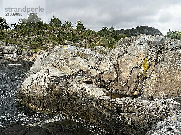 Granite rocks on the coast of the Bjørnafjord in Norway