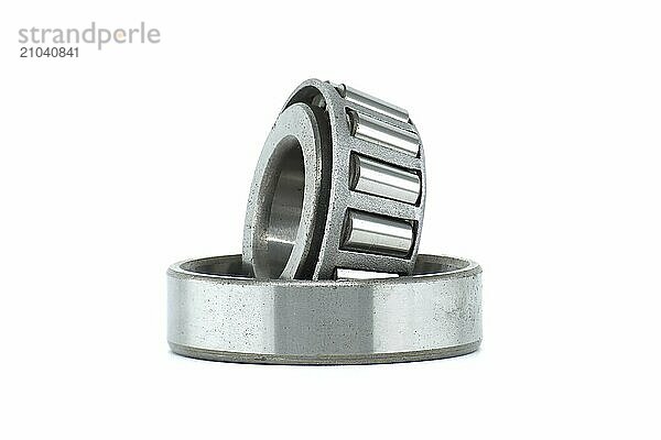 Tapered roller bearing isolated on white background. Car bearings  auto parts  automobile components for the engine and chassis suspension