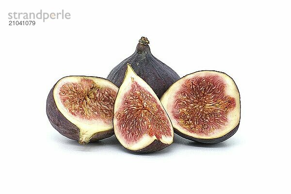 Fresh figs whole and sliced in half isolated over white background  full depth of field