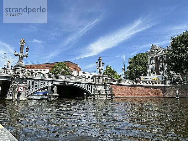 Amsterdam  Netherlands. June 23  2023. The blue bridge over the Amstel River in Amsterdam