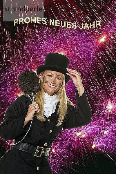 Female chimney sweep in front of fireworks on New Year's Eve  Lower Saxony  Federal Republic of Germany