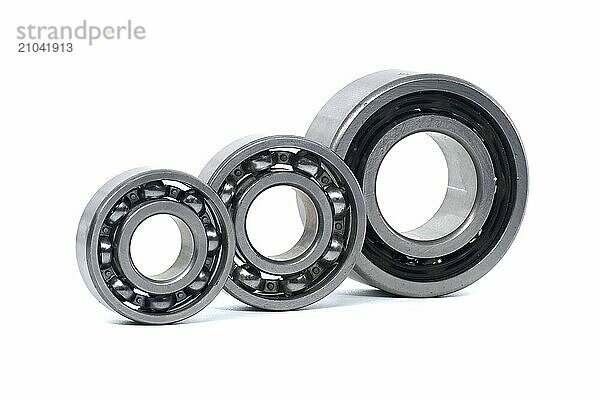 Ball bearings without seal and deep groove ball bearing with steel seal isolated on white background