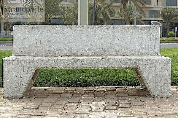 White concrete bench in Kuwait park