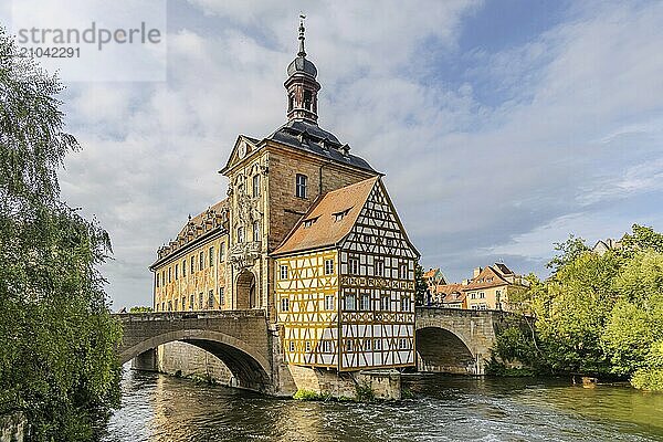 Old Town Hall on an artificial island in the River Regnitz. The landmark can be reached via two arched bridges. City view of Bamberg  Upper Franconia  Bavaria  Germany  Europe