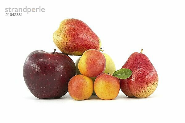 Whole ripe apricots  multicolored pear  red and green apples isolated on a white background. Multivitamin and juicy rich fruits