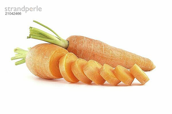 Whole carrot and sliced pieces  all with a bright orange color isolated on a white background