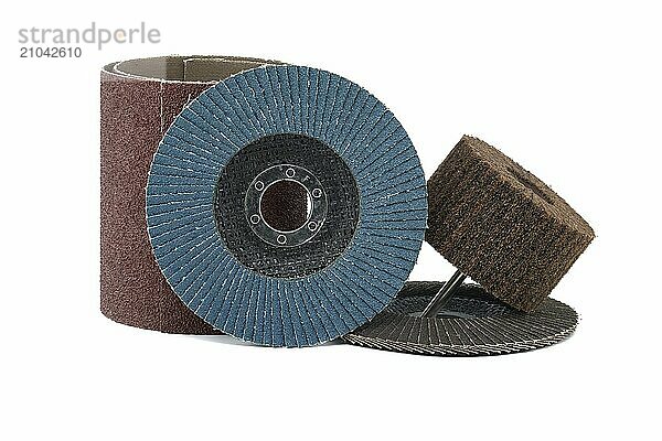 Flap discs for angle grinders  abrasive cloth flap wheels for use in drill in close-up view isolated on white background