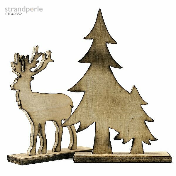 Stag figure sawn out of wood with dark edges and wooden fir trees cut out on white