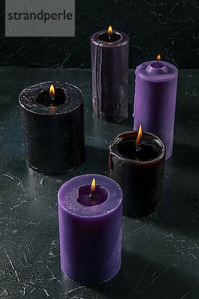 Burning candles on a dark background  mysterious ritual  Food photography  Food photography