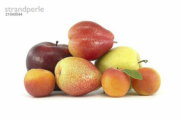 Whole ripe apricots  multicolored pear and apple isolated on a white background. Multivitamin and juicy rich fruits