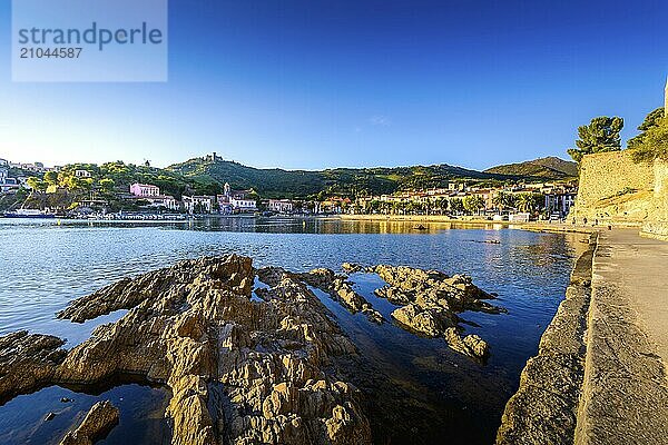 Collioure bay with rocks and beach at morning at Occitanie in France