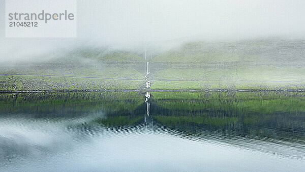 Fog over Fossa waterfall  Faroe Islands