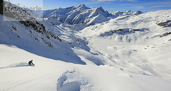 A young man skiing alone in powder snow  Gressoney  Valle d'Aosta  Italy.