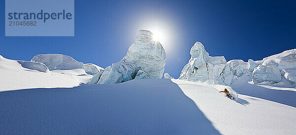 A young man skiing among some crevasses in Zermatt  Switzerland