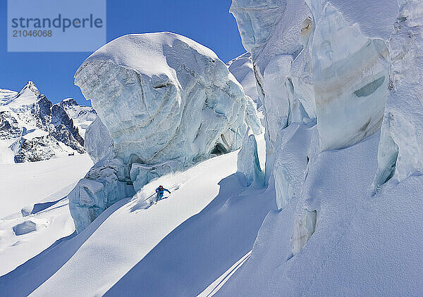 A young man skiing among some crevasses in Zermatt  Switzerland