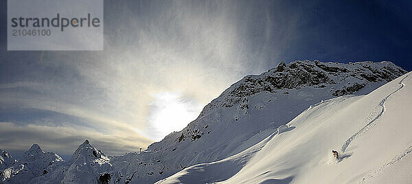 A young man skiing in untouched powder snow in Alagna  Piemonte  Italy.